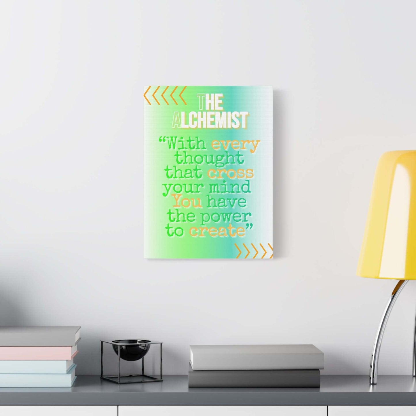 The Alchemist inspirational quote canvas print with uplifting message, mint and aqua background, and bold typography.