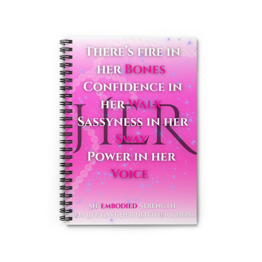 Inspirational pink spiral notebook with motivational text about confidence and power on a bright pink cover.