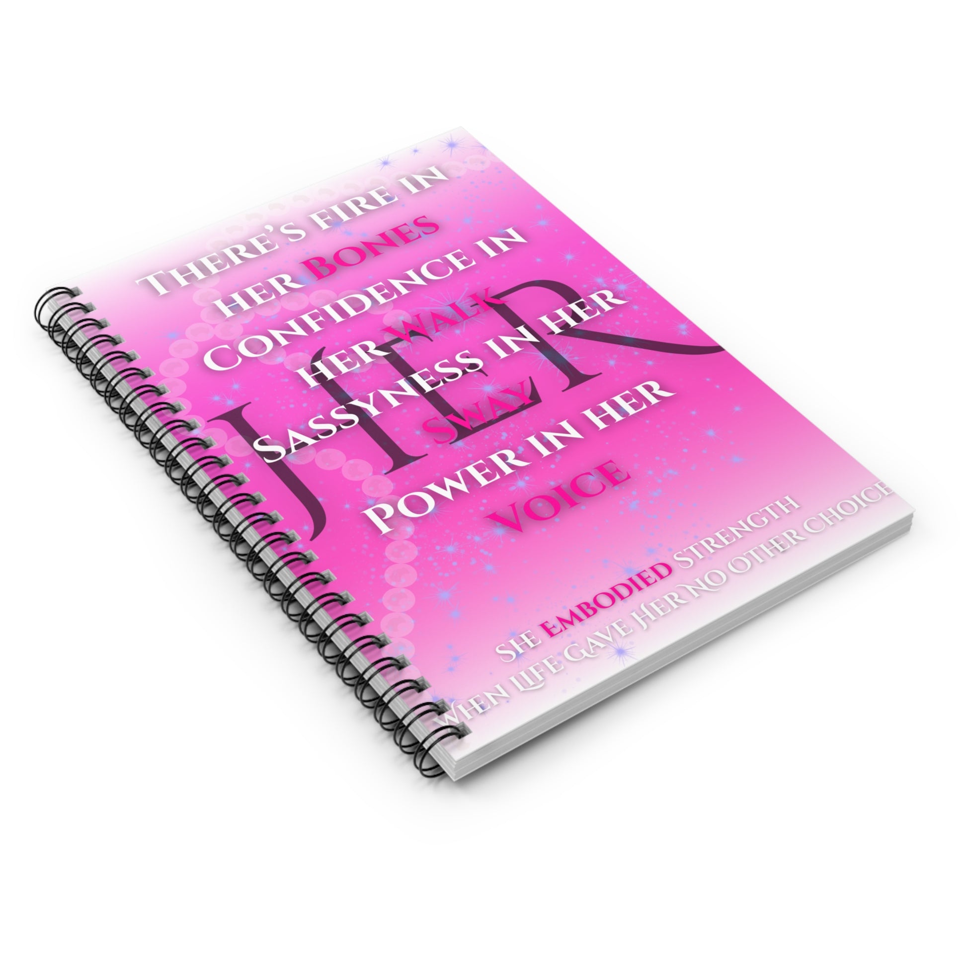 Inspirational pink spiral notebook with bold text promoting confidence and empowerment on bright pink cover.